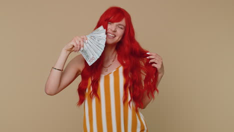 Redhead-girl-holding-cash-money-dollar-celebrate-dance,-success-business-career,-lottery-game-winner