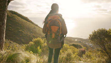 woman, hiking and freedom on mountain for fitness