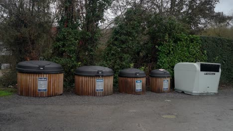 row of separate garbage containers for a durable environmental world