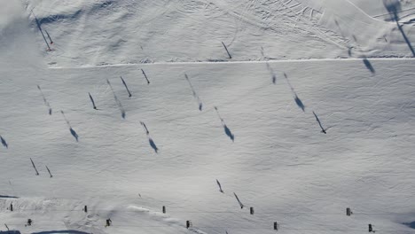 skilift from above with shadows in the dolomites