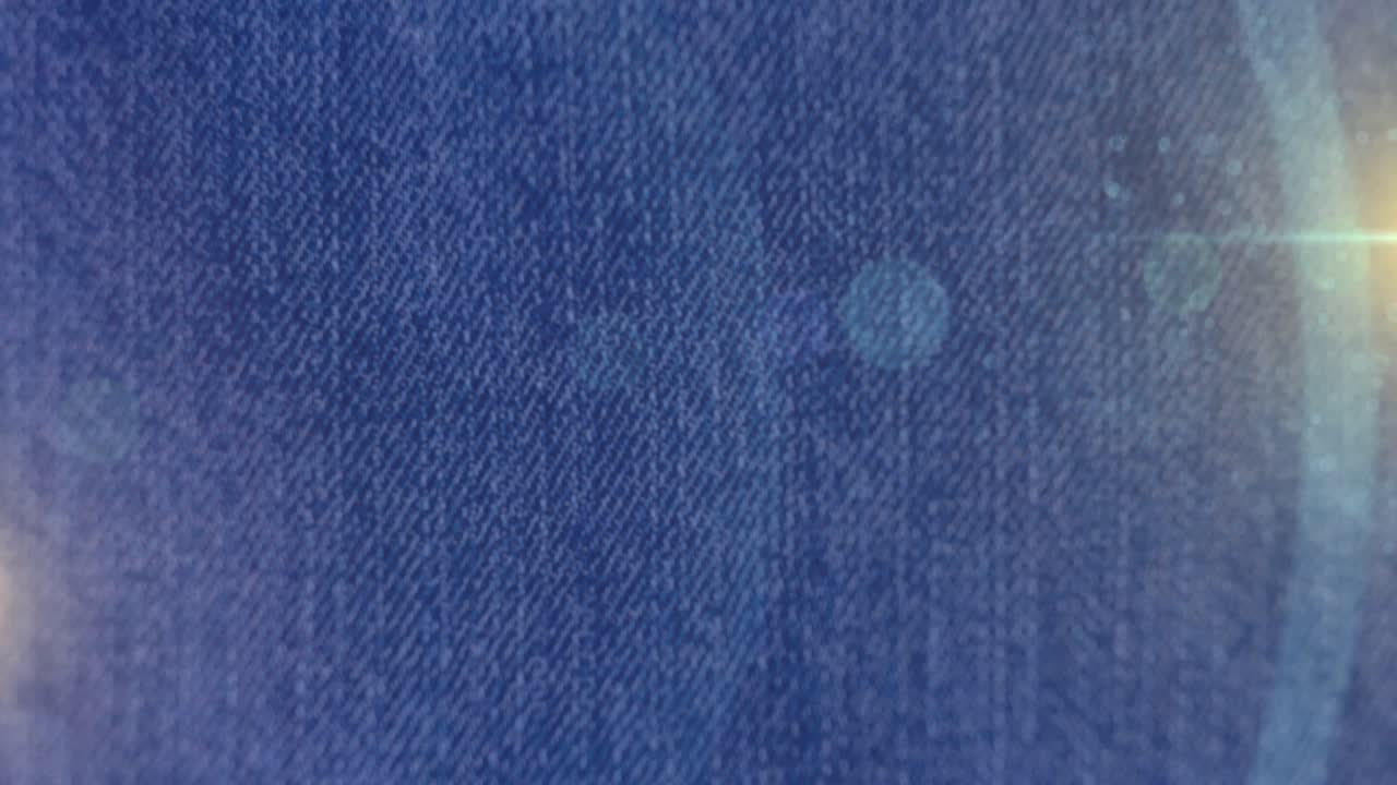 Animazione di punti luce su pantaloni di denim