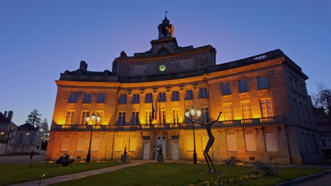 alencon town hall illuminated in evening, orne in normandie, france