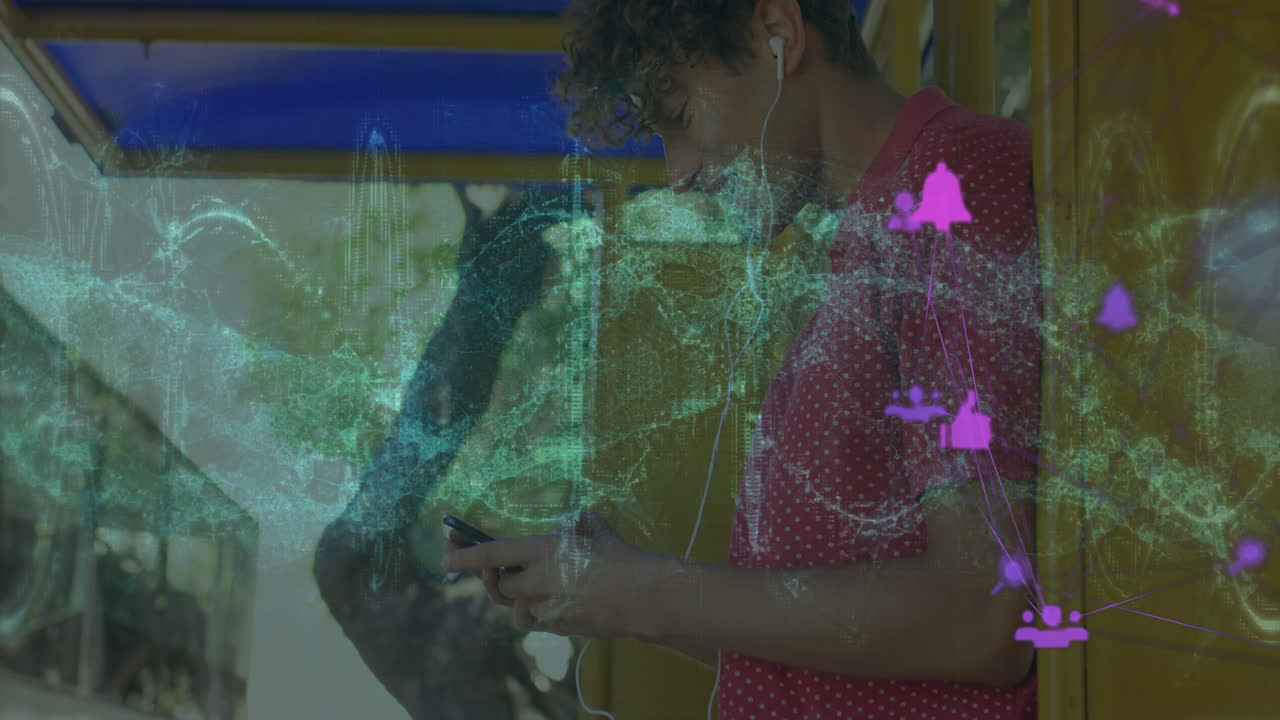 Man using smartphone under yellow transit shelter, showing floating tech icons and data charts