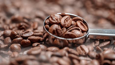 Close-up-of-seeds-of-coffee.-Fragrant-coffee-beans-are-roasted-smoke-comes-from-coffee-beans.