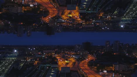 inverted cityscape at night