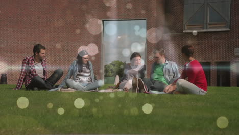 amigos relajándose en la hierba con animación de luz de burbujas