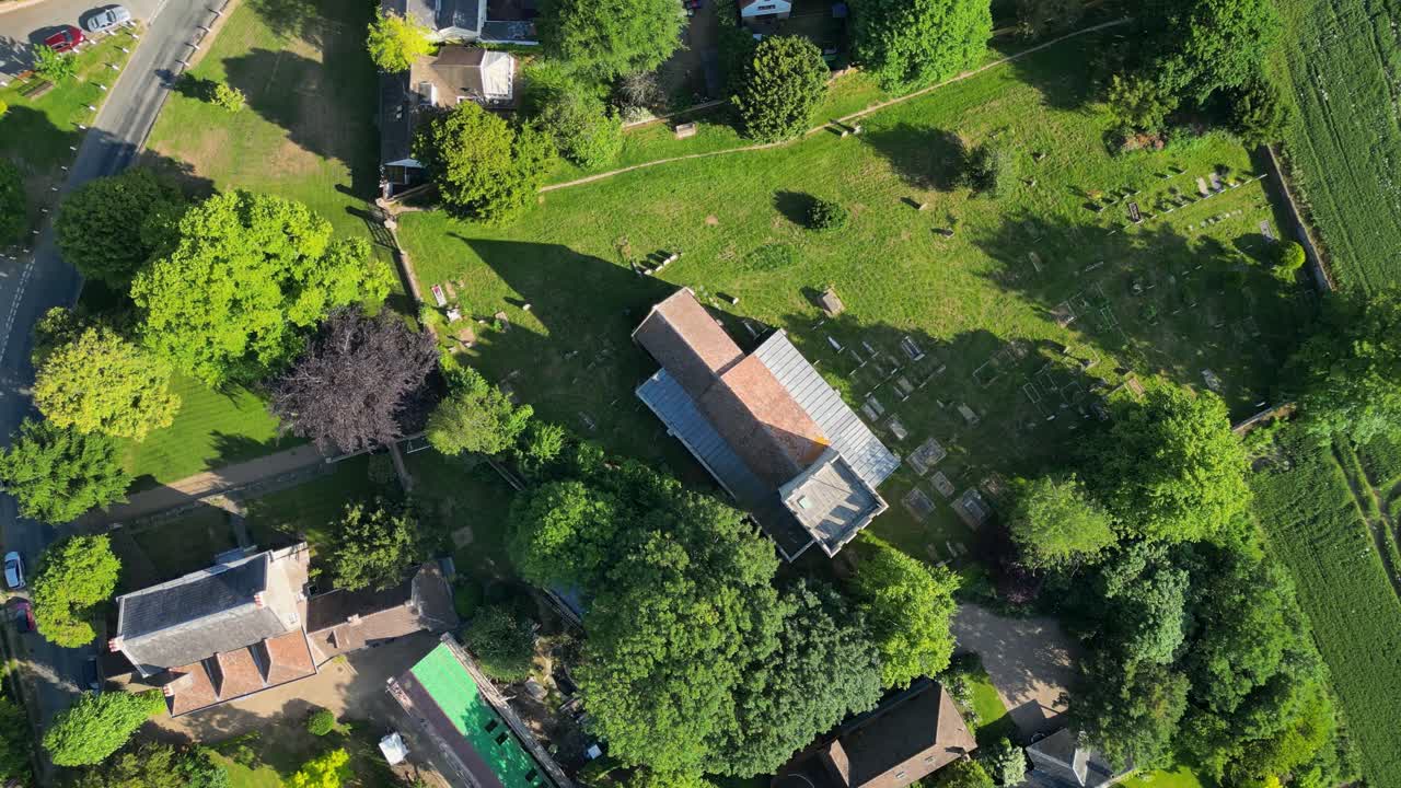 A bird's-eye-view roll-shot of St Andrew's church in Wickhambreaux