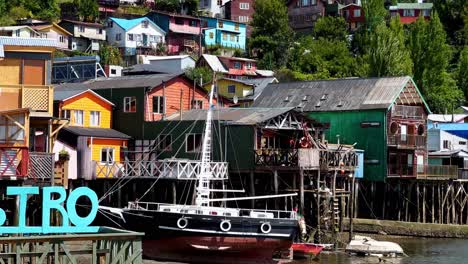 Close-Shot-of-Colorful-Houses-Elevated-Above-Water-in-Castro-Chiloé-Delta-Island