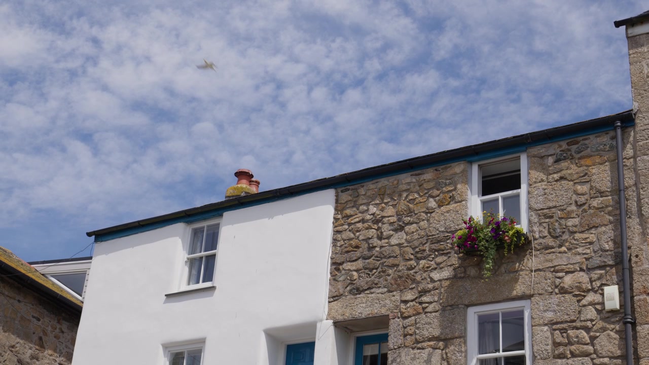 Traditionelle hytter i den gamle bydel i St. Ives i Cornwall, England, Storbritannien. Lavvinkelbillede