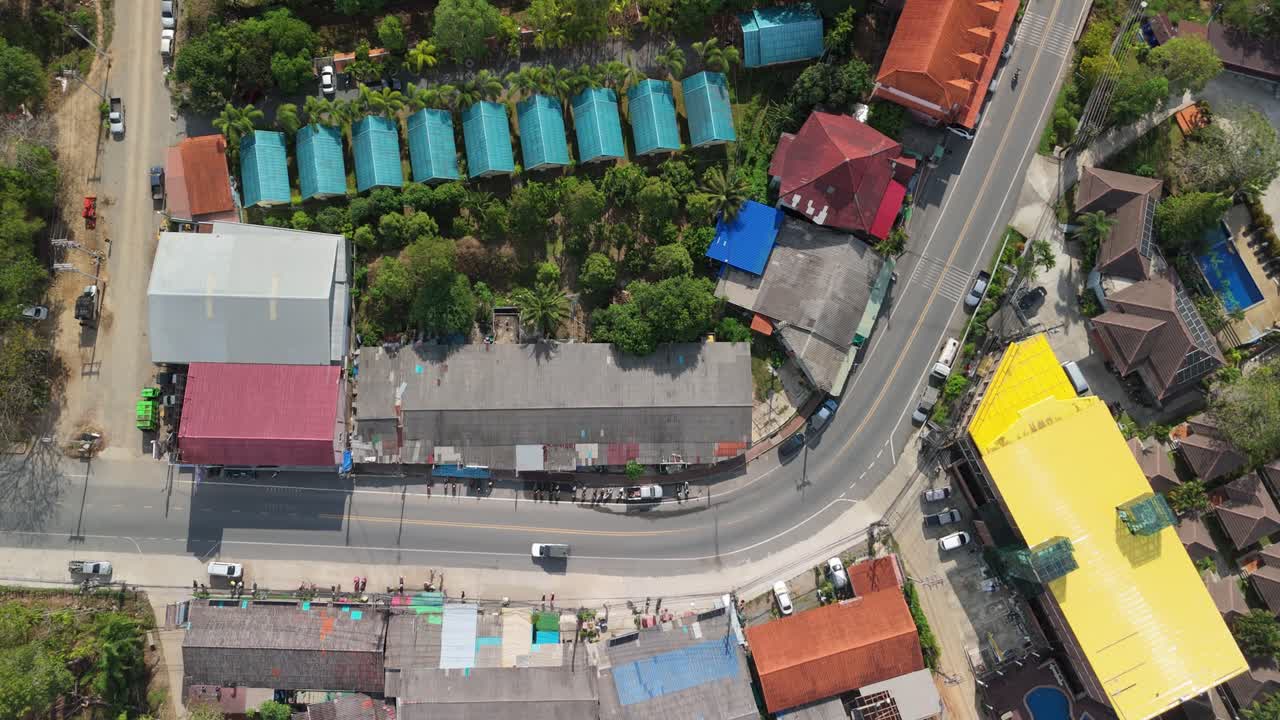 A birds-eye view of Klong Prao main road with buildings and resorts on Koh Chang island
