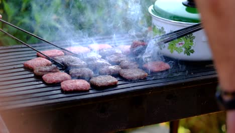 meatballs that are cooked on one side are turned slow motion