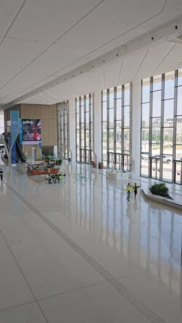 an inside view of the dubai exhibition centre (dec) at expo city dubai, uae, showcasing its expansive facilities and state-of-the-art infrastructure