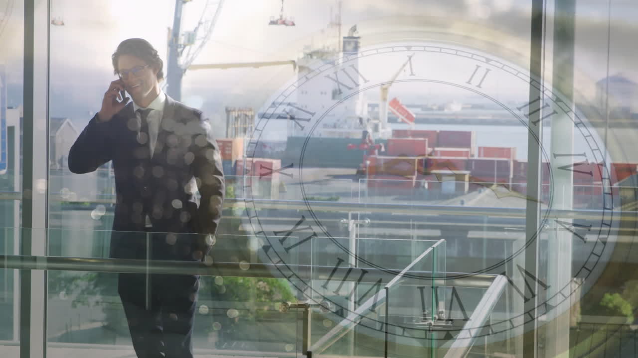 Businessman talking on phone over clock animation and shipping port background
