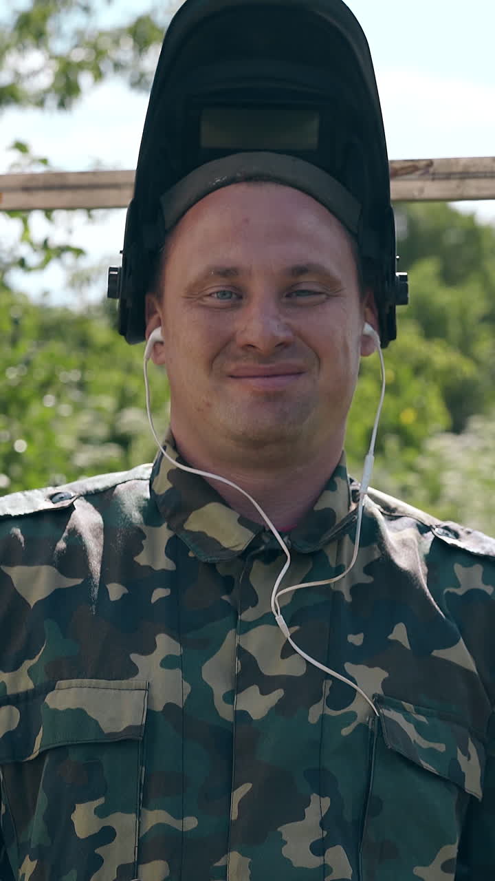 Welder in Camouflage Uniform