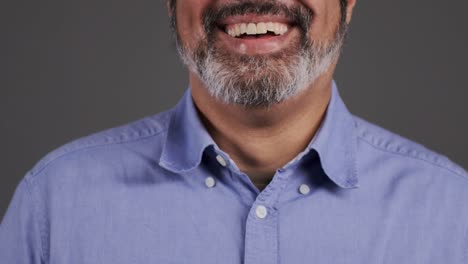 middle aged man smiling and laughing portrait