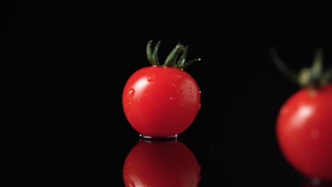 close-up of fresh cherry tomatoes with water droplets