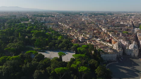 Amazing-aerial-panoramic-footage-of-historic-urban-borough.-Sights-and-landmarks-in-morning.-Fly-above-Terrazzo-del-Pinkie-and-Piazza-del-Popolo.-Rome,-Italy