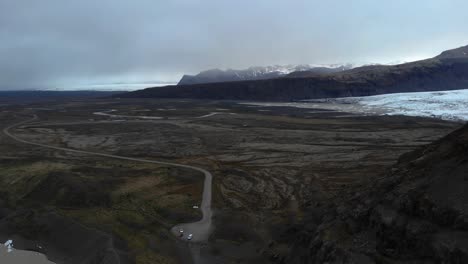 aerial footage over svinafellsjokull glacial point in iceland