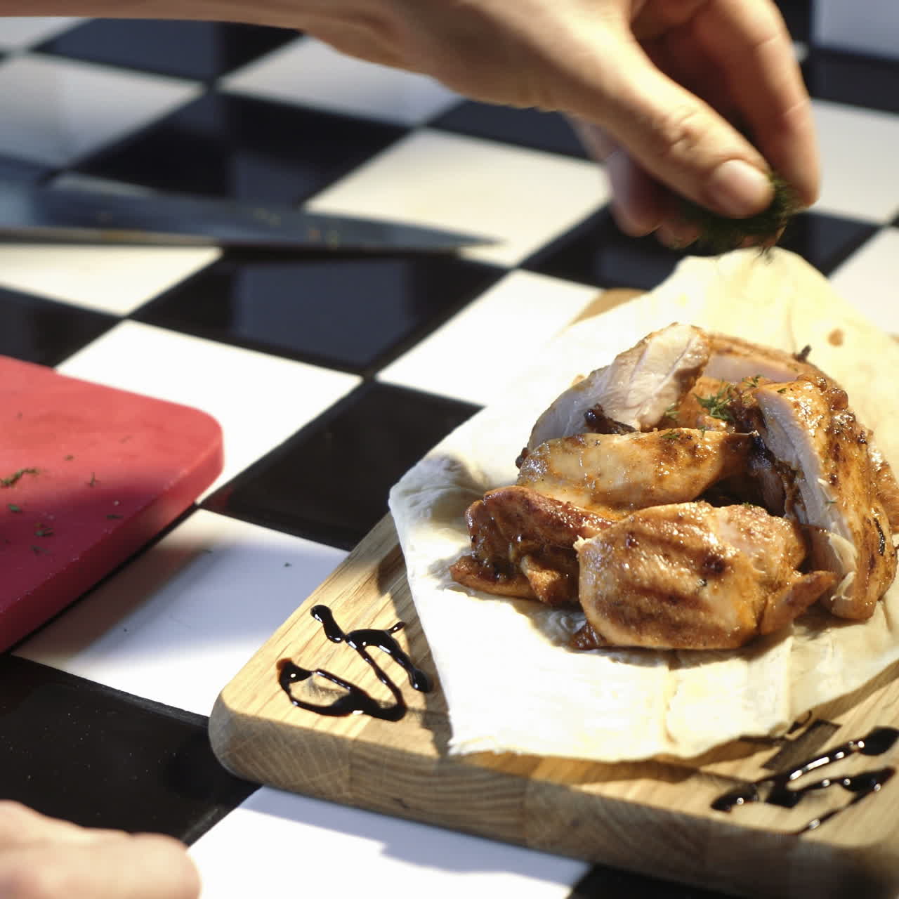 Chef taking steak off the grill, making presentation of dish Sqare video