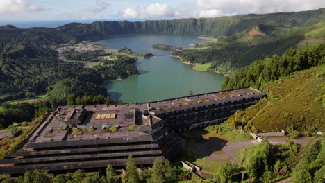 Drone-riser-behind-abandoned-Monte-Palace-Hotel-reveals-epic-vista-over-caldera