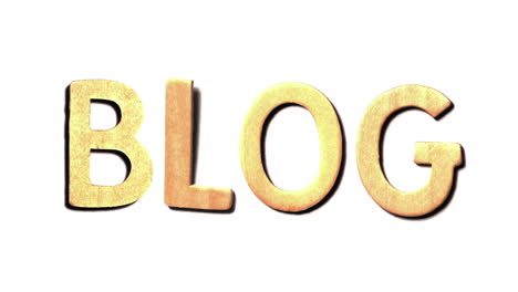 the word blog landing on white surface