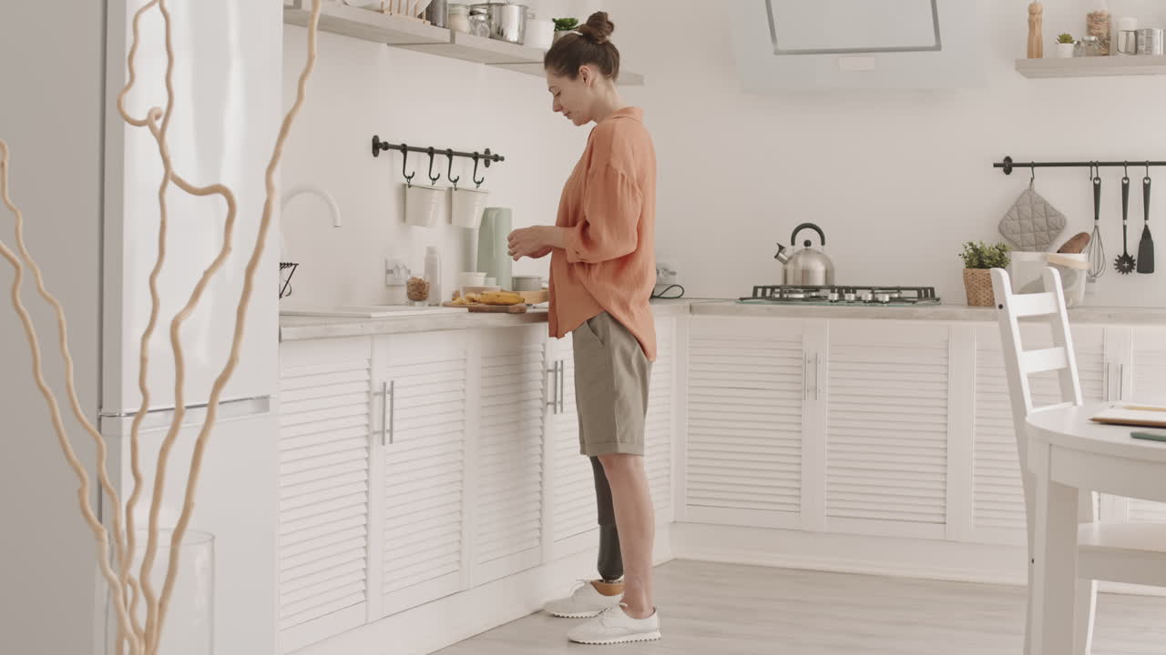 Woman with Disability Making Breakfast