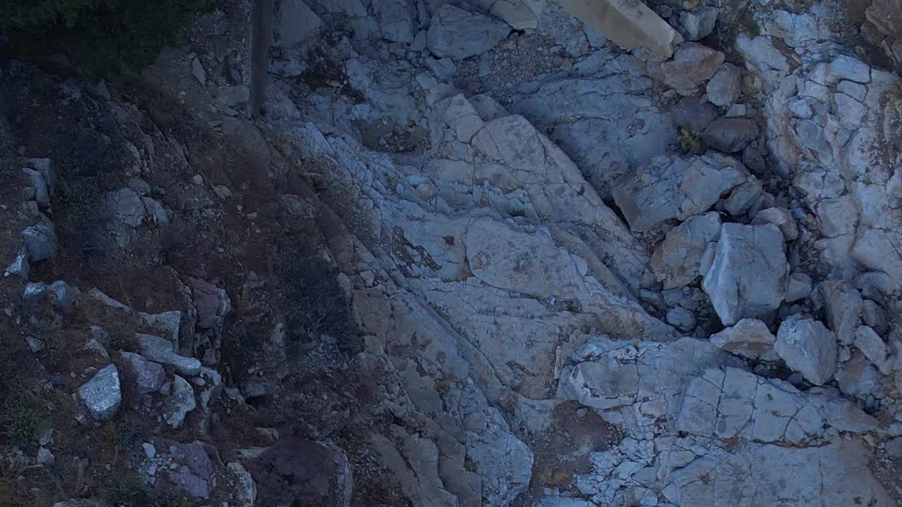 Scenic aerial view of rocky terrain in Greece surrounded by nature