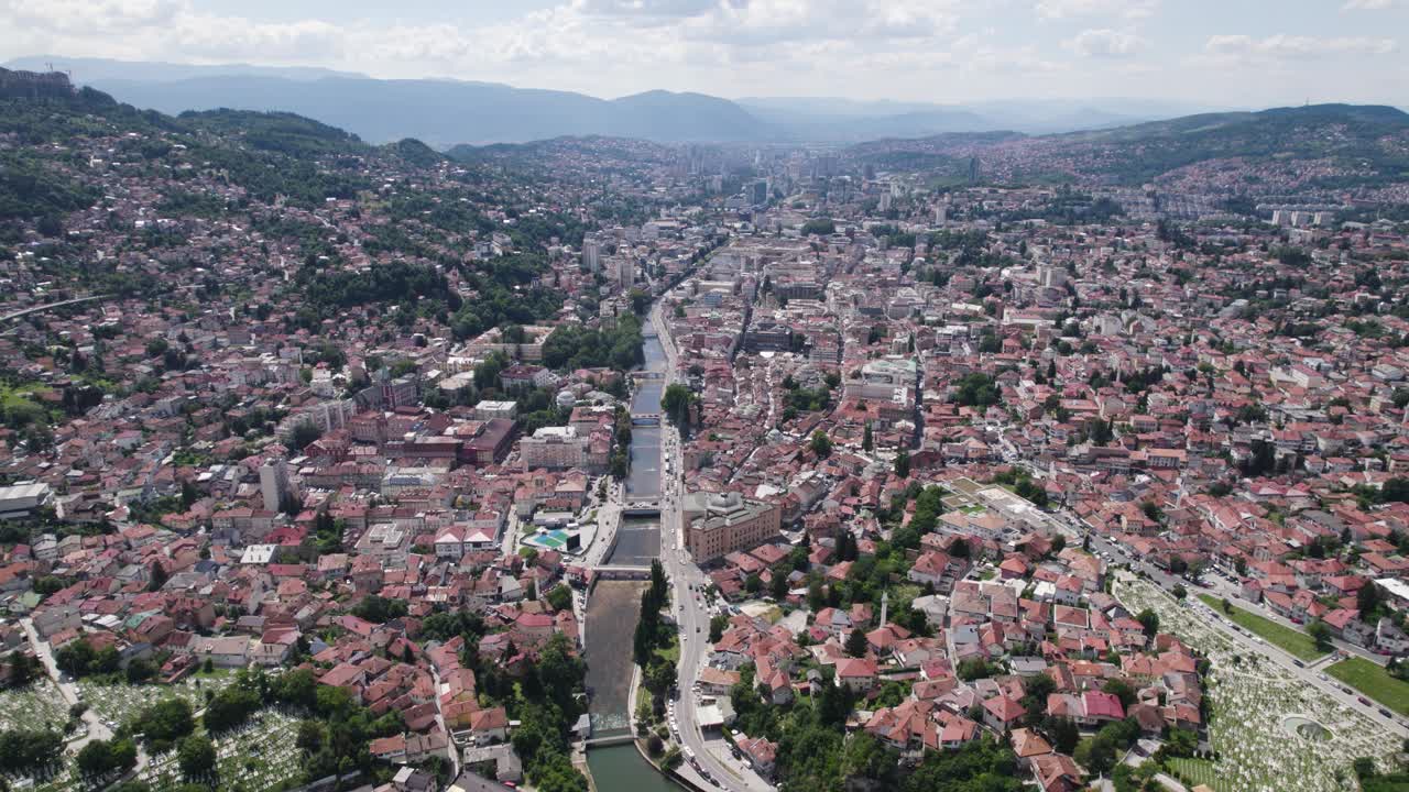 Aerial: dense cityscape with river, Sarajevo, Bosnia and Herzegovina