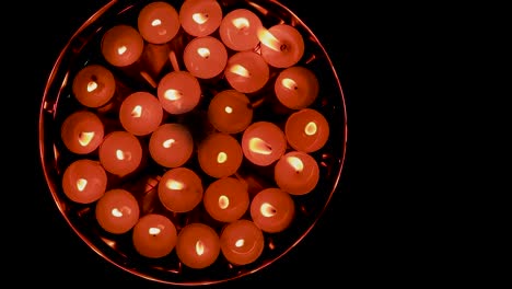 lighted-flickering-candles-in-plat-for-decoration-on-the-occasion-of-diwali-from-top-angle