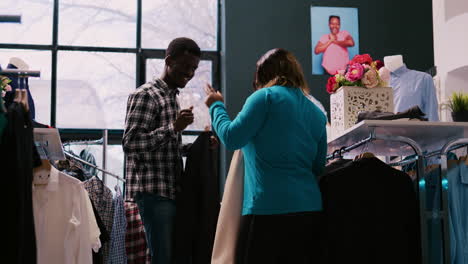 clients holding stylish clothes