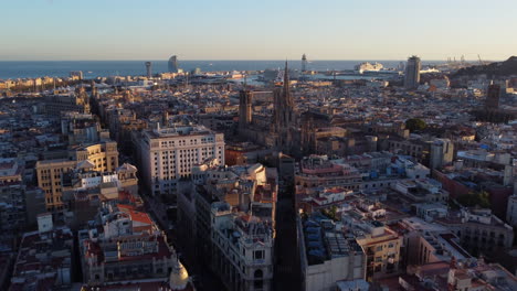 coastal architecture of barcelona spanish city. aerial view at sunset
