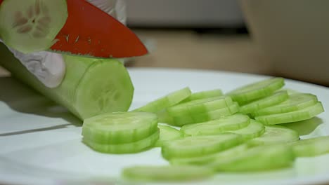 a peeled green cucumber that is sliced