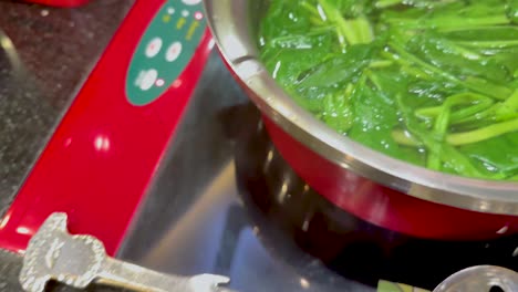 vegetables and broth in a hot pot