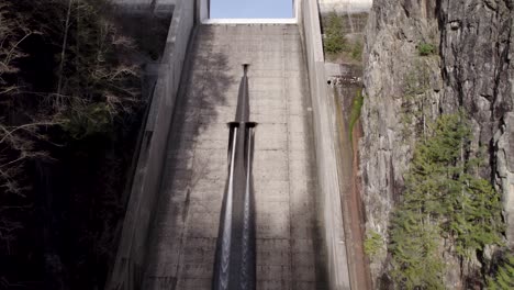 Aerial-view-of-Cleveland-Dam-at-the-head-of-the-Capilano-River-in-North-Vancouver,-British-Columbia,-Canada