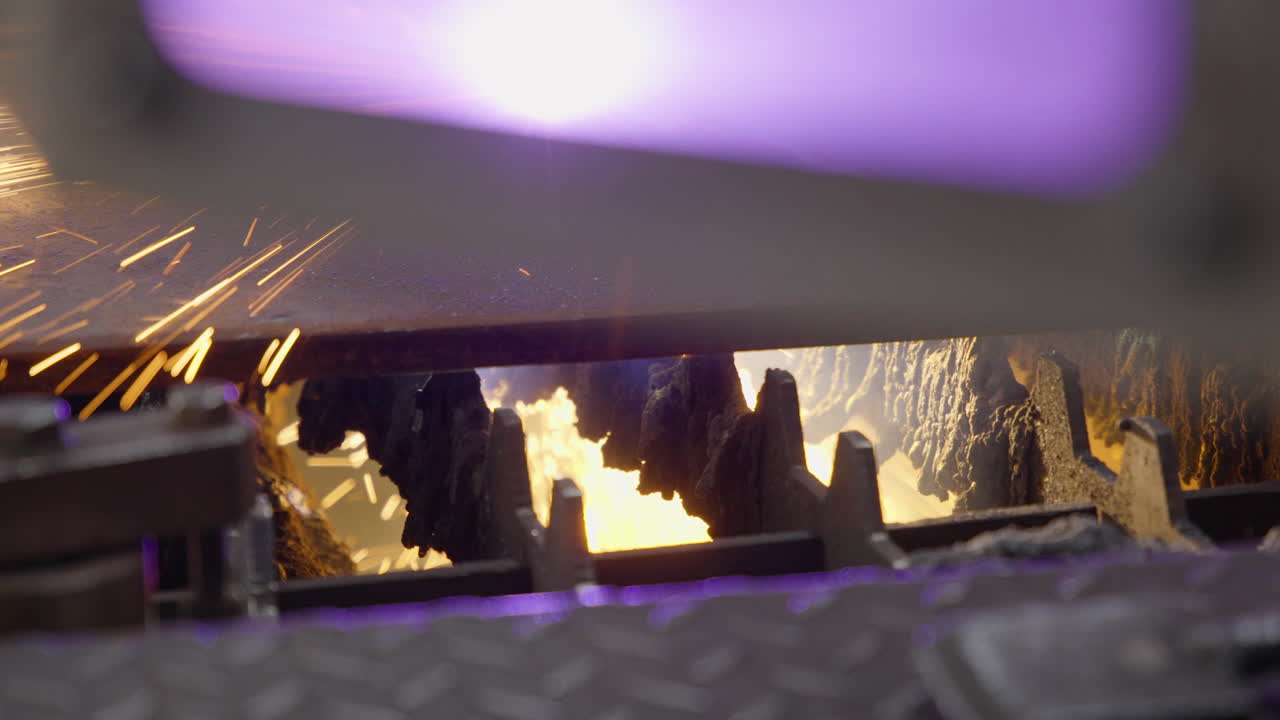 plasma cutting metal plate slow motion detail