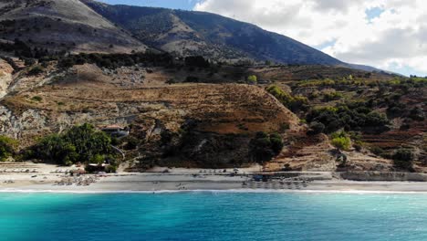 the rocky landscape of agia kiriaki beach in milos, greece - aerial drone dolly shot