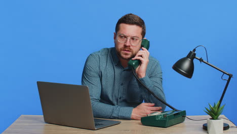 man having telephone conversation with client call center or support service operator helpline