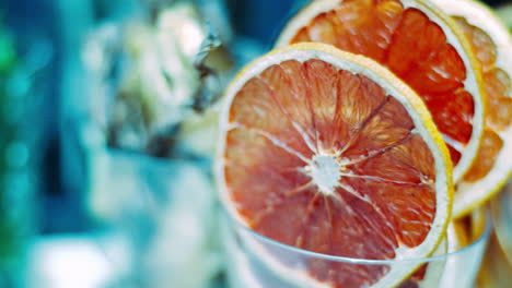 Red-grapefruit-slices-in-glass-prepared-for-use-in-cocktails