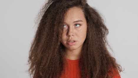 caucasian curly haired woman feeling exhausted.