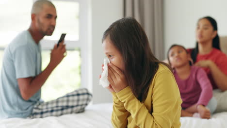 niña enferma, fiebre y un hombre con una llamada telefónica a