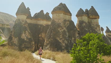 woman tourists explores unique rock formation landscape cappadocia