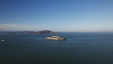 aerial view approaching the alcatraz island, golden hour in san francisco, usa