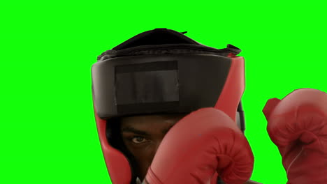 boxer in helmet punching towards camera