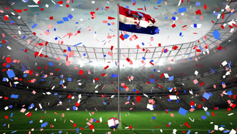 animation of colorful confetti falling over waving croatia flag against sport stadium