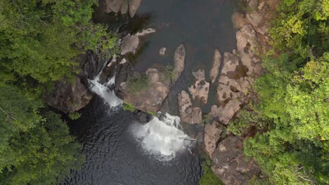Beautiful-aerial-view-flight-vertical-bird's-eye-view-drone
of-thailand-jungle-waterfall-koh-kood,-day-dezember-2022