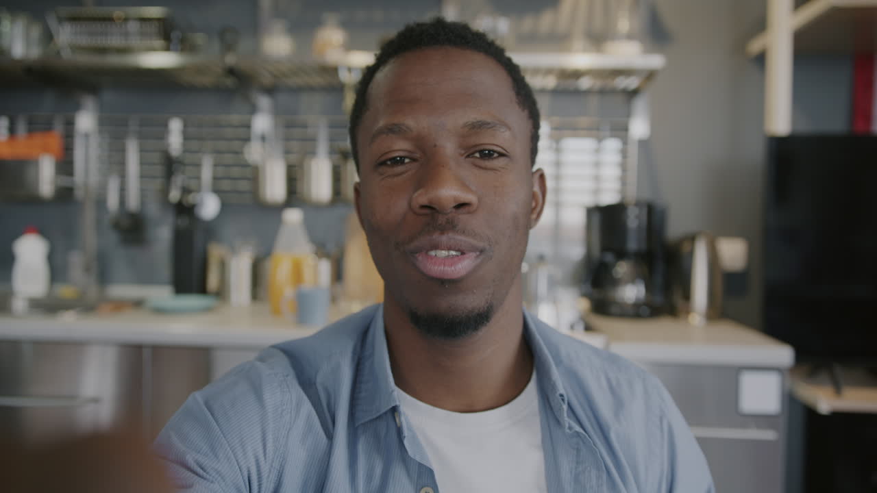Man on a video call in his kitchen