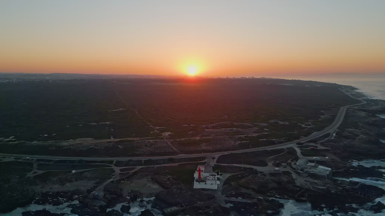 Awesome golden sundown seashore horizon drone view. Orange sun move down shore