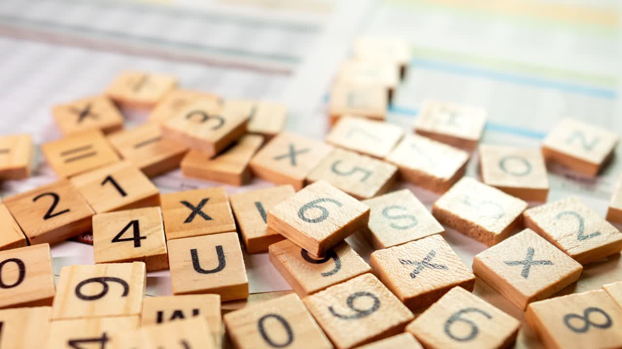 Explore the intricate arrangement of numbered tiles in a creative workspace capturing the essence of inspiration.