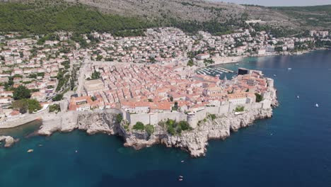 Aerial:-Dubrovnik,-Croatia-showcasing-its-historic-old-town-and-coastline