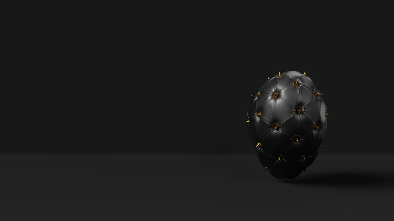 rotativo corazón negro 3d decorado con picos dorados.